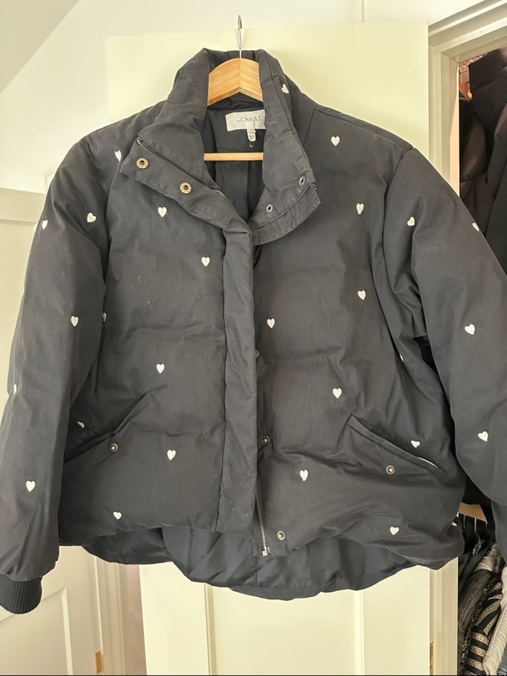 THE GREAT. Black Puffer Jacket with White Heart Print